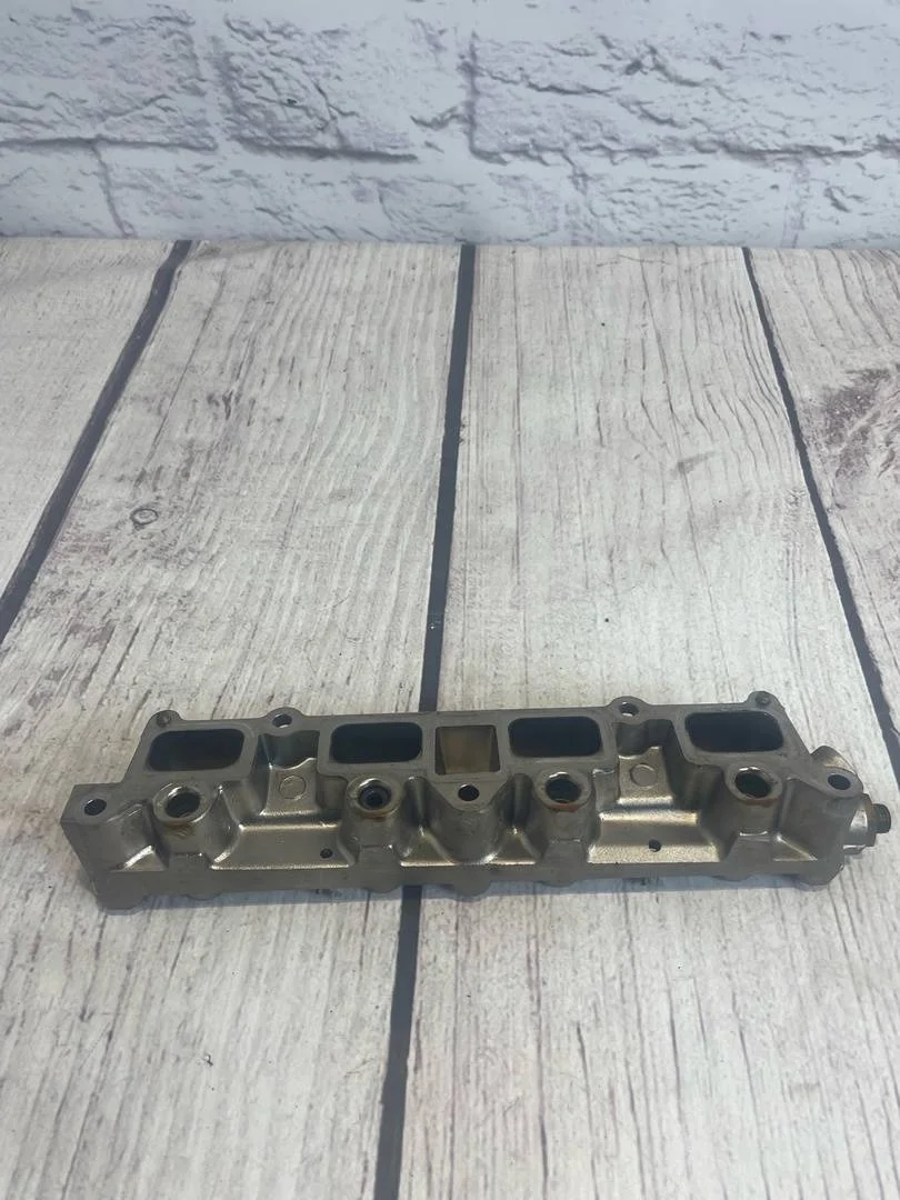 Коллектор впускной VW Tiguan 1 2011