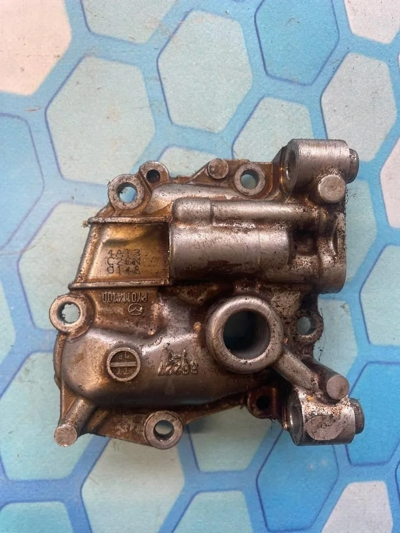 Крышка масляного насоса Mazda