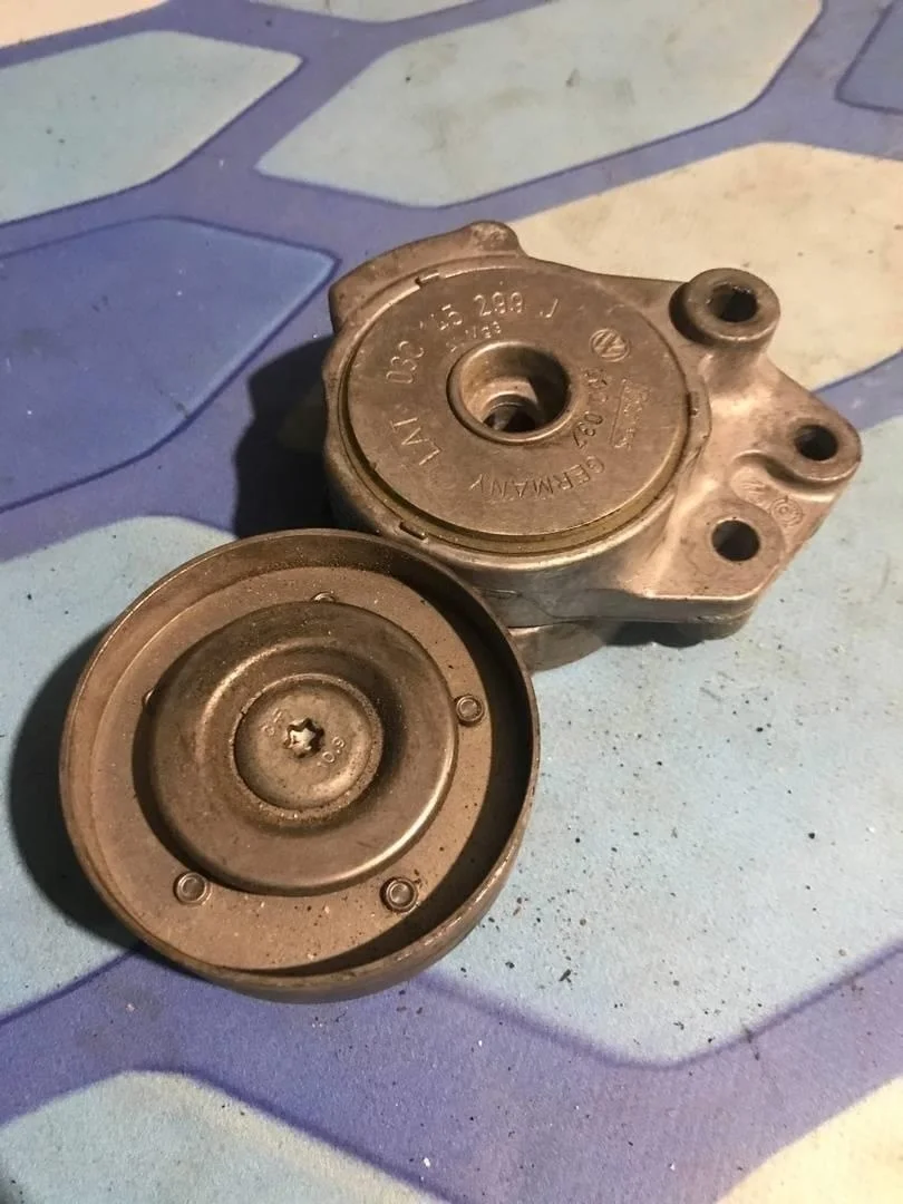 Ролик натяжителя ремня VW Tiguan 1 2007-2011