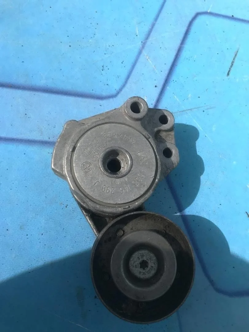 Ролик натяжителя ремня VW Tiguan 1 2007-2011