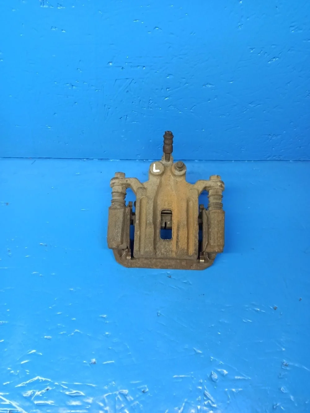 Суппорт тормозной задний левый Nissan Pathfinder III (2004—2010) б.у