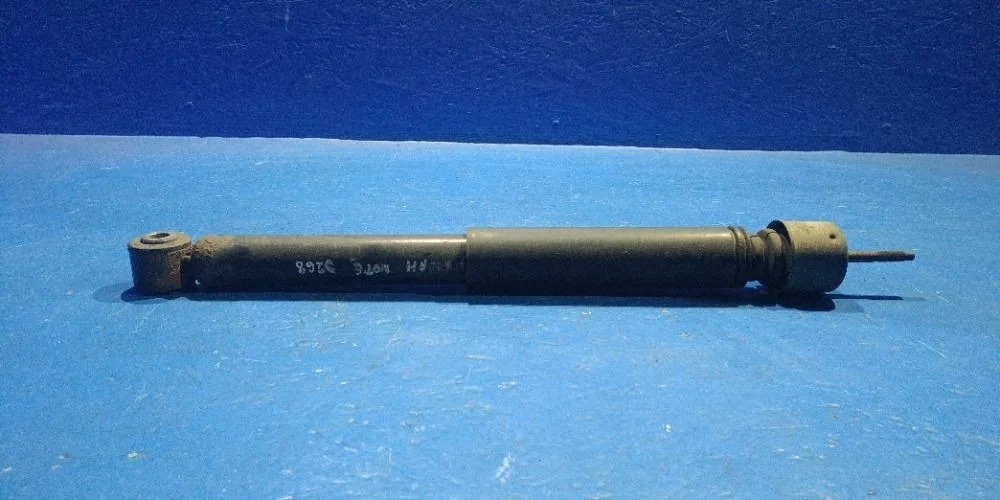 Амортизатор задний L=R Nissan Note E11 (2005—2009) б.у