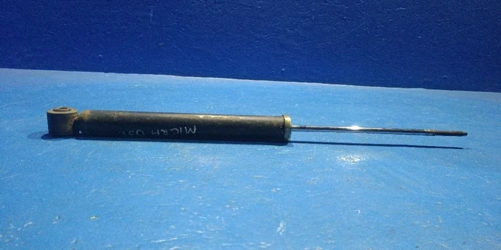 Амортизатор задний L=R Nissan Micra K12 (2002—2010) б.у