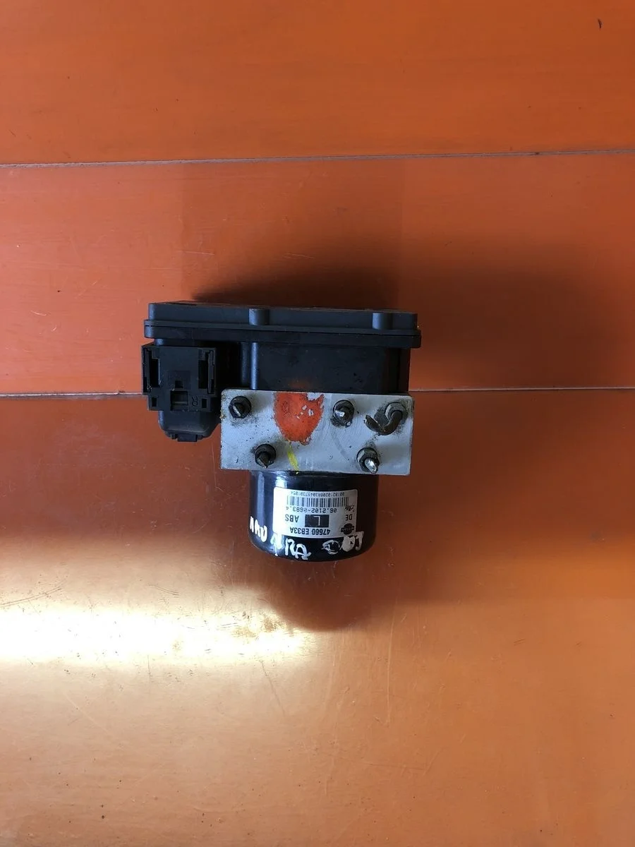 Блок (насос) ABS Nissan Navara D40 (2004—2010) б.у