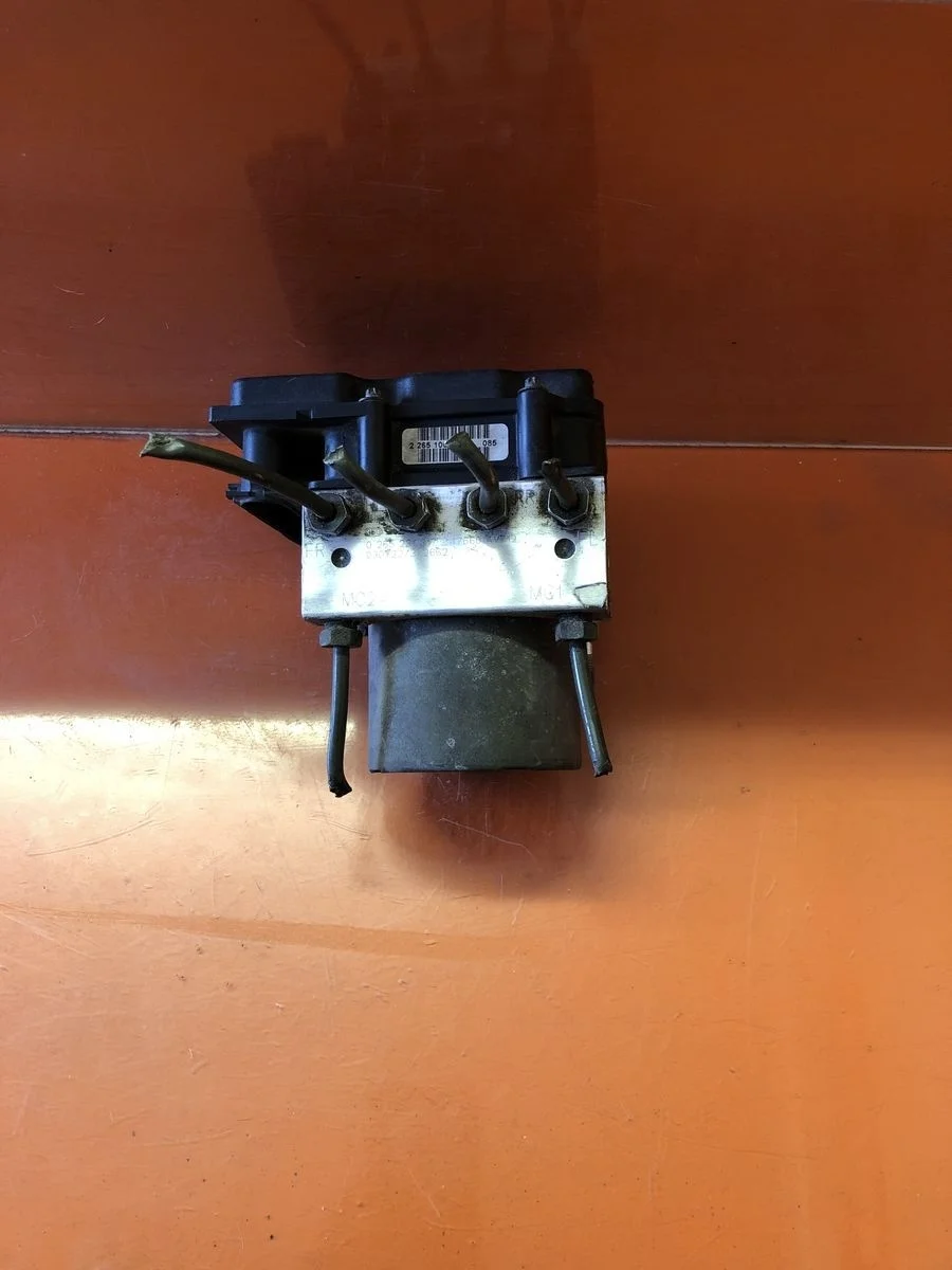 Блок (насос) ABS Nissan Primera P12 (2001—2008) б.у