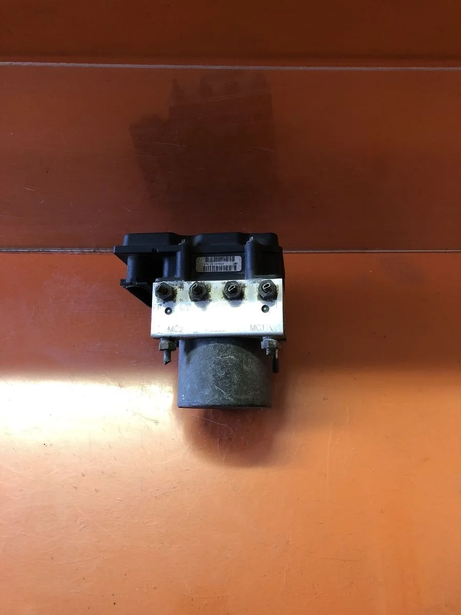 Блок (насос) ABS Nissan Primera P12 (2001—2008) б.у