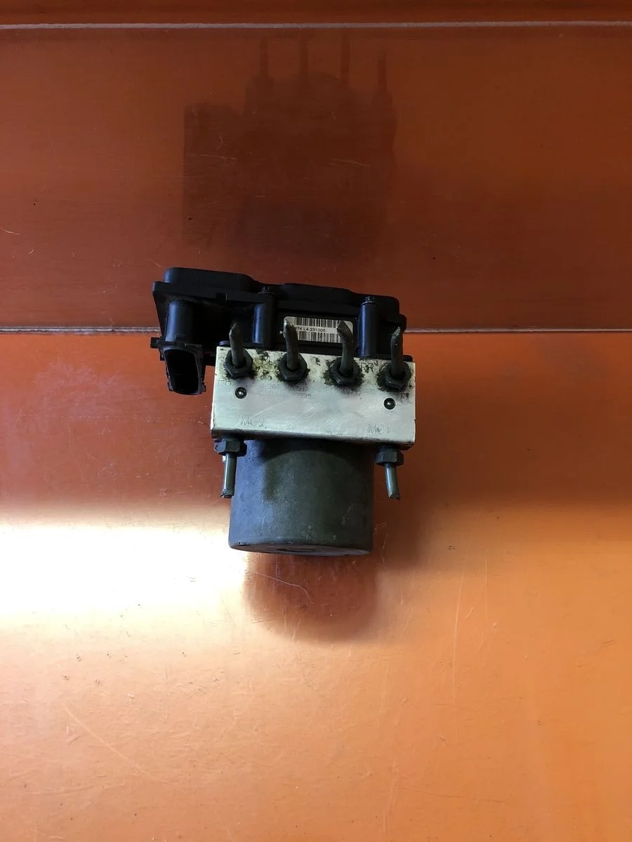 Блок (насос) ABS Nissan Primera P12 (2001—2008) б.у