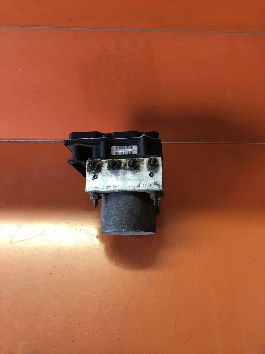 Блок (насос) ABS Nissan Primera P12 (2001—2008) б.у