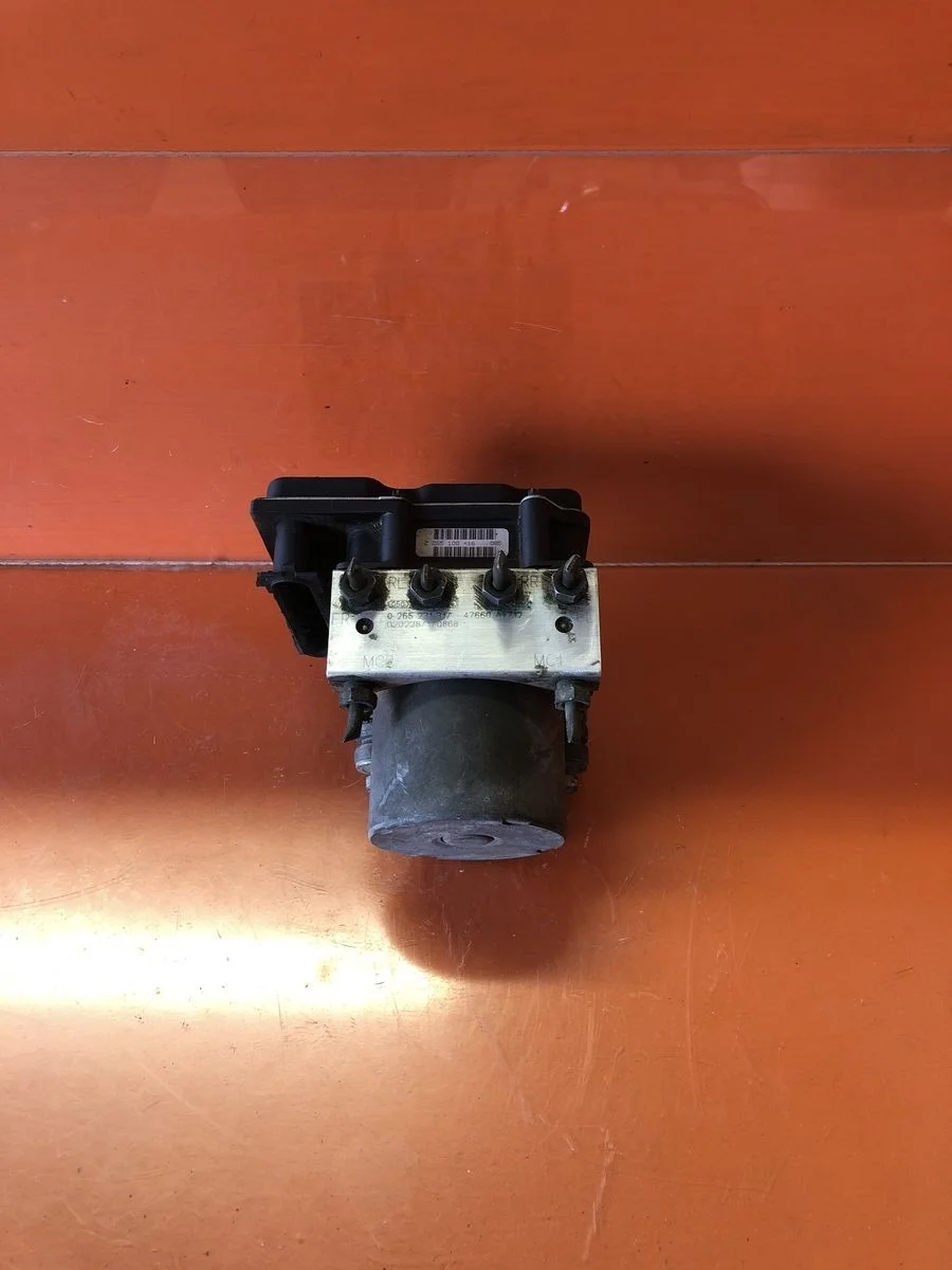 Блок (насос) ABS Nissan Primera P12 (2001—2008) б.у