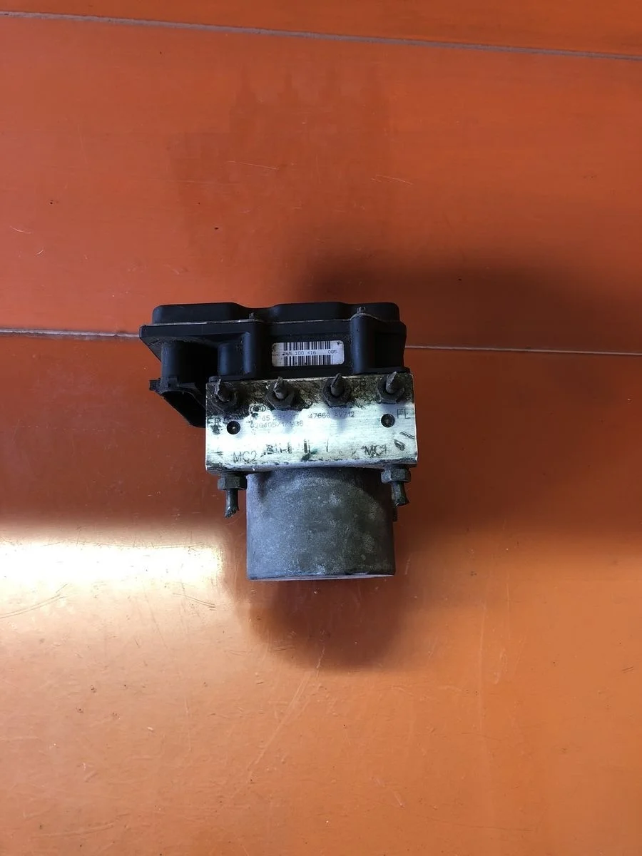 Блок (насос) ABS Nissan Primera P12 (2001—2008) б.у