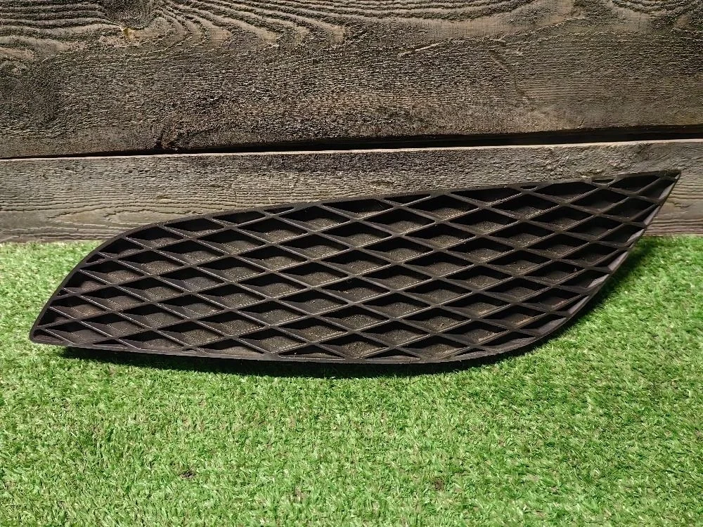 Заглушка бампера левая Opel Astra H