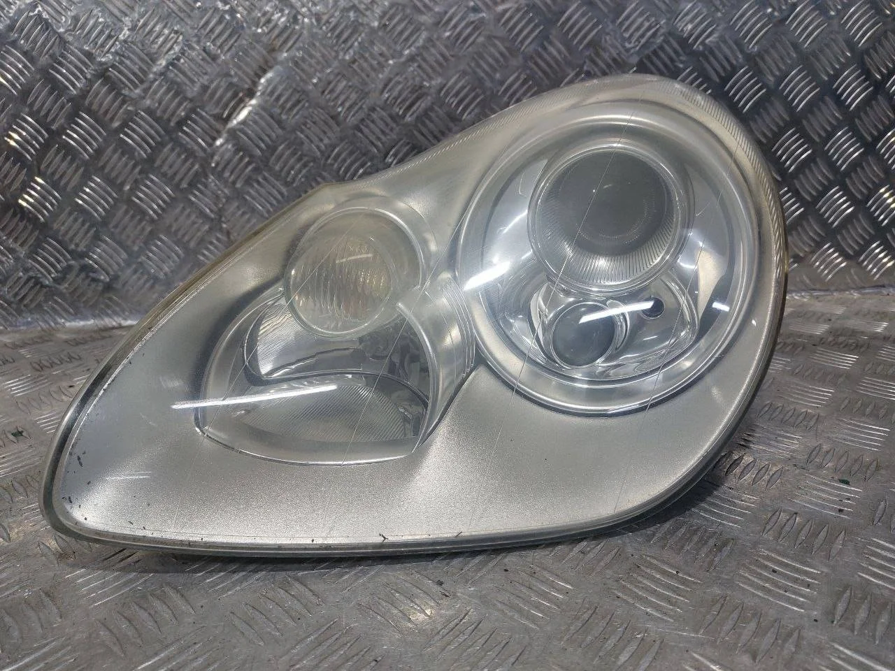 фара левая Porsche Cayenne 955