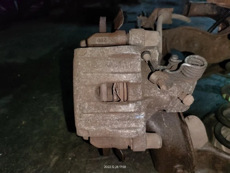 Суппорт задний левый Ford Focus 2 (08-11) КУПЕ