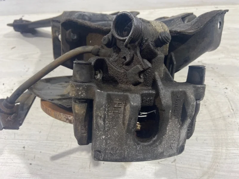 Суппорт задний левый Ford Focus 3 (11-14) ХЭТЧБЕК