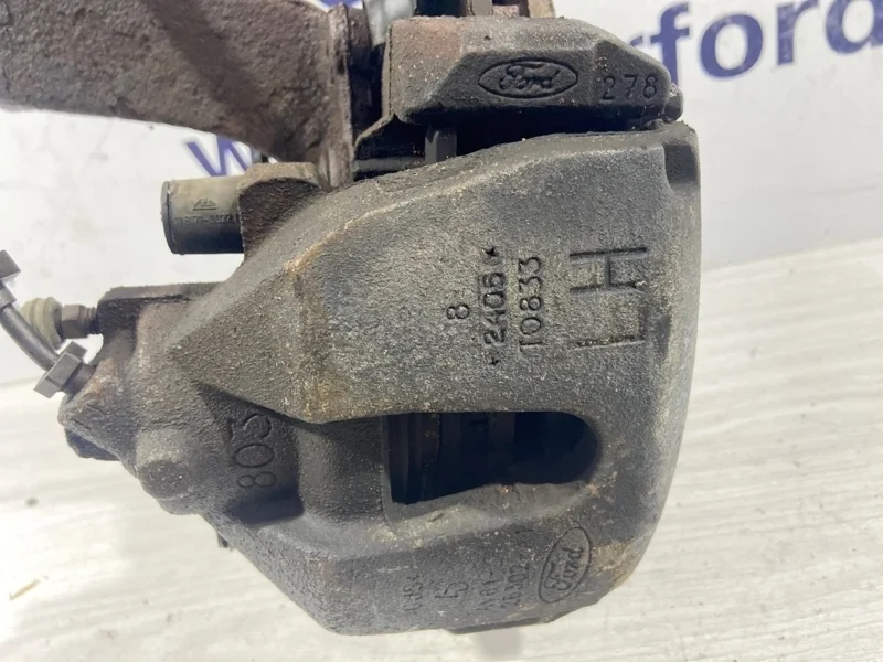 Суппорт передний левый Ford Focus 3 (14-19) СЕДАН