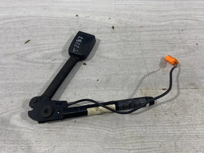 Преднатяжитель ремня безопасности левый FORD