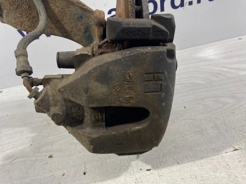 Суппорт передний левый Ford Focus 3 (11-14)