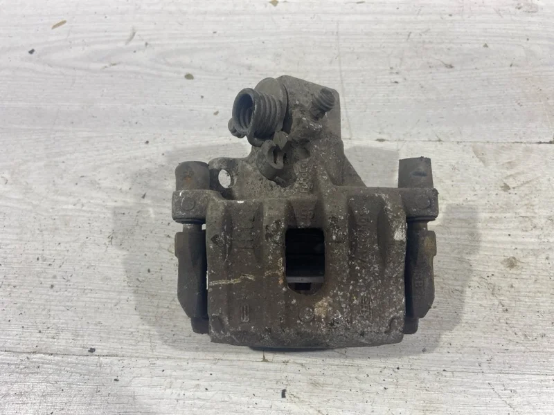 Суппорт задний левый Ford Focus 2 (08-11)