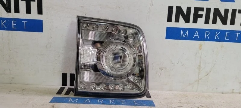 Фонарь в крышку багажника задний левый NISSAN