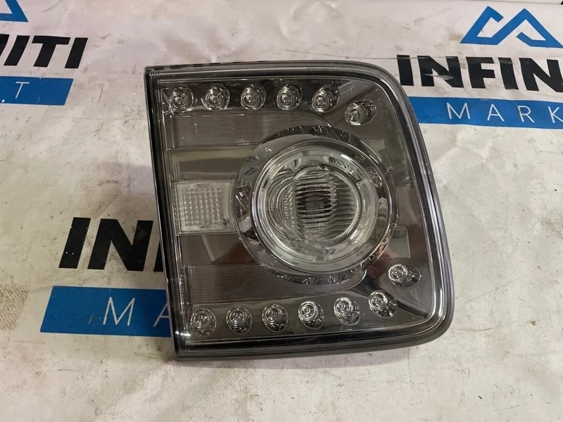 Фонарь в крышку багажника задний левый NISSAN