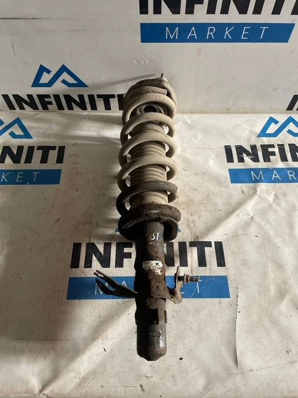 Амортизатор стойка подвески передний левый