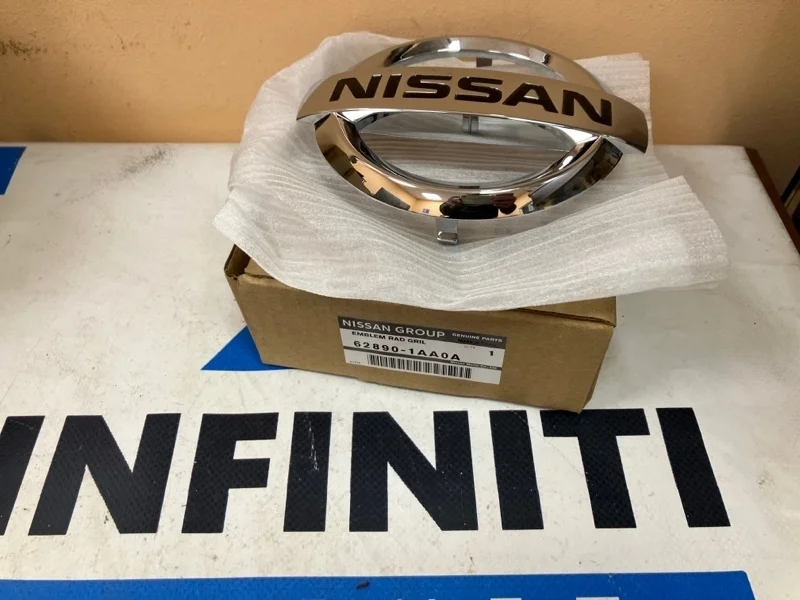 Эмблема шильдик знак решетки радиатора NISSAN