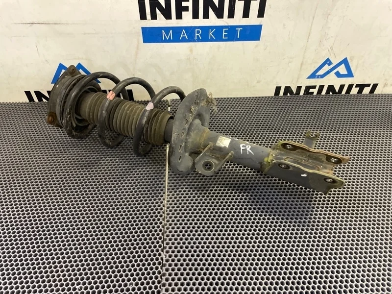 Амортизатор стойка подвески передний правый NISSAN