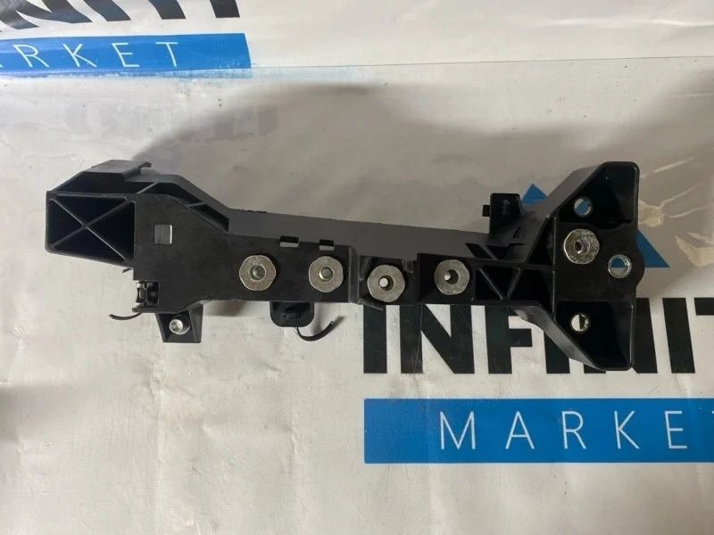 Кронштейн передей панели к крылу передний правый