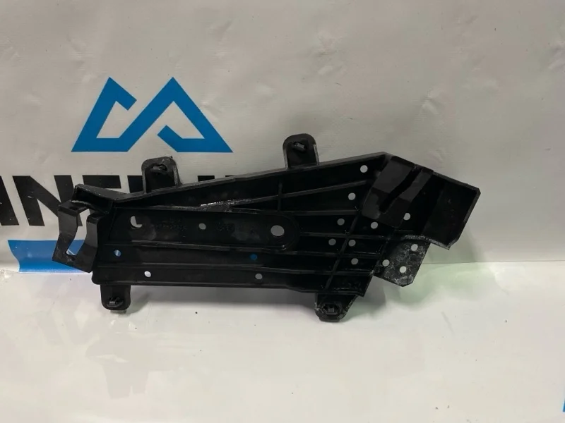 Кронштейн направляющая фары передний левый