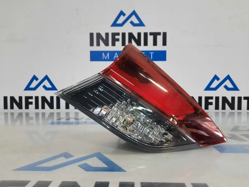 Фонарь в крышку багажника задний левый NISSAN