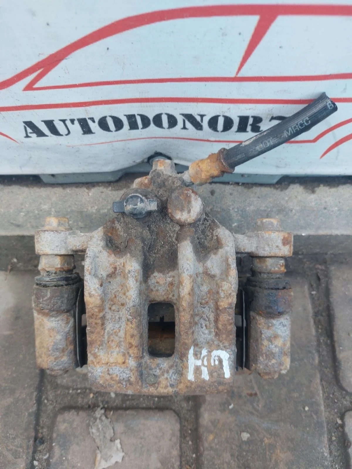 Суппорт тормозной задний левый Kia Ceed ED (2006—2010)