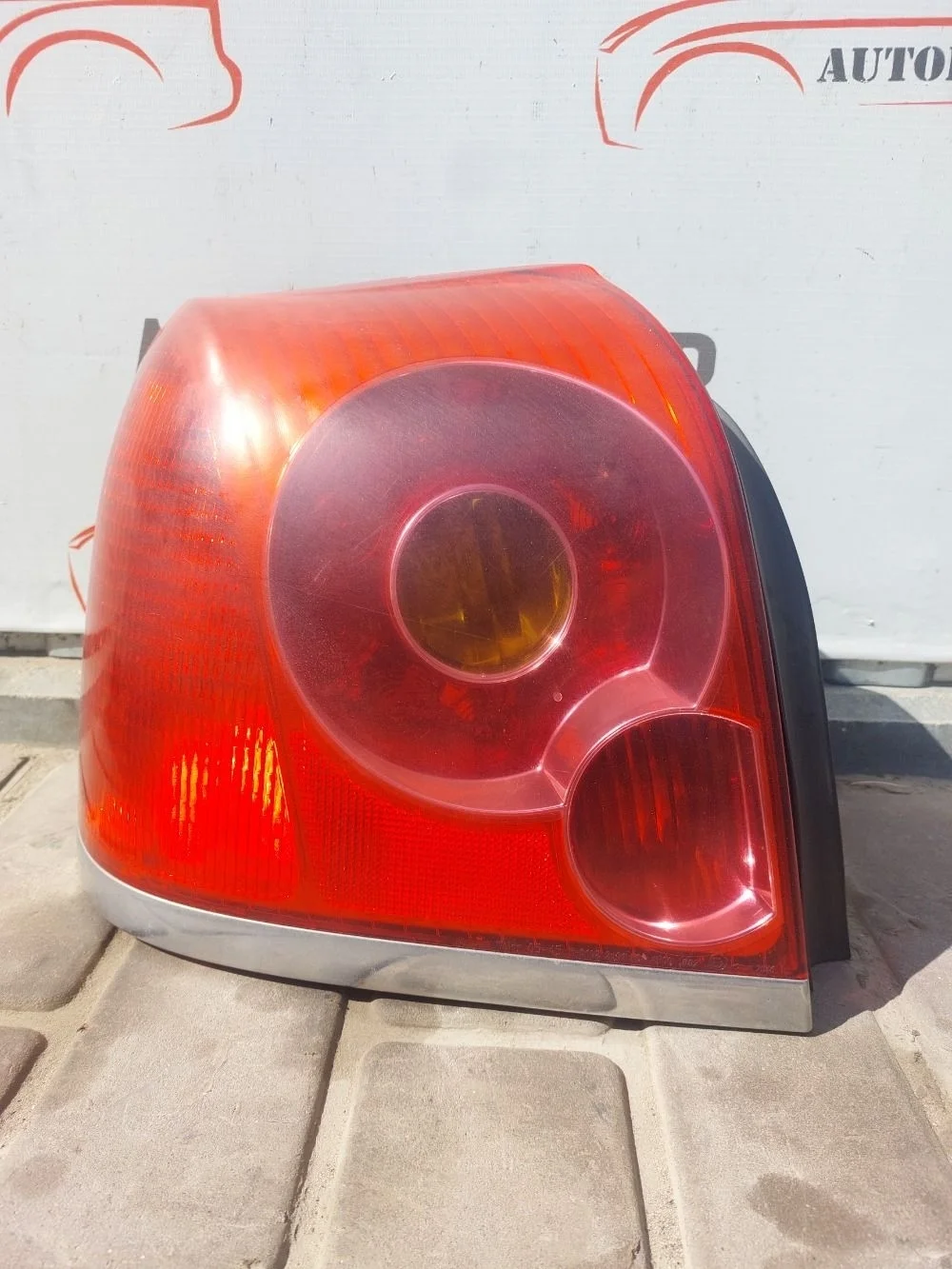 Фонарь задний левый Toyota Avensis T250 (2003—2006)