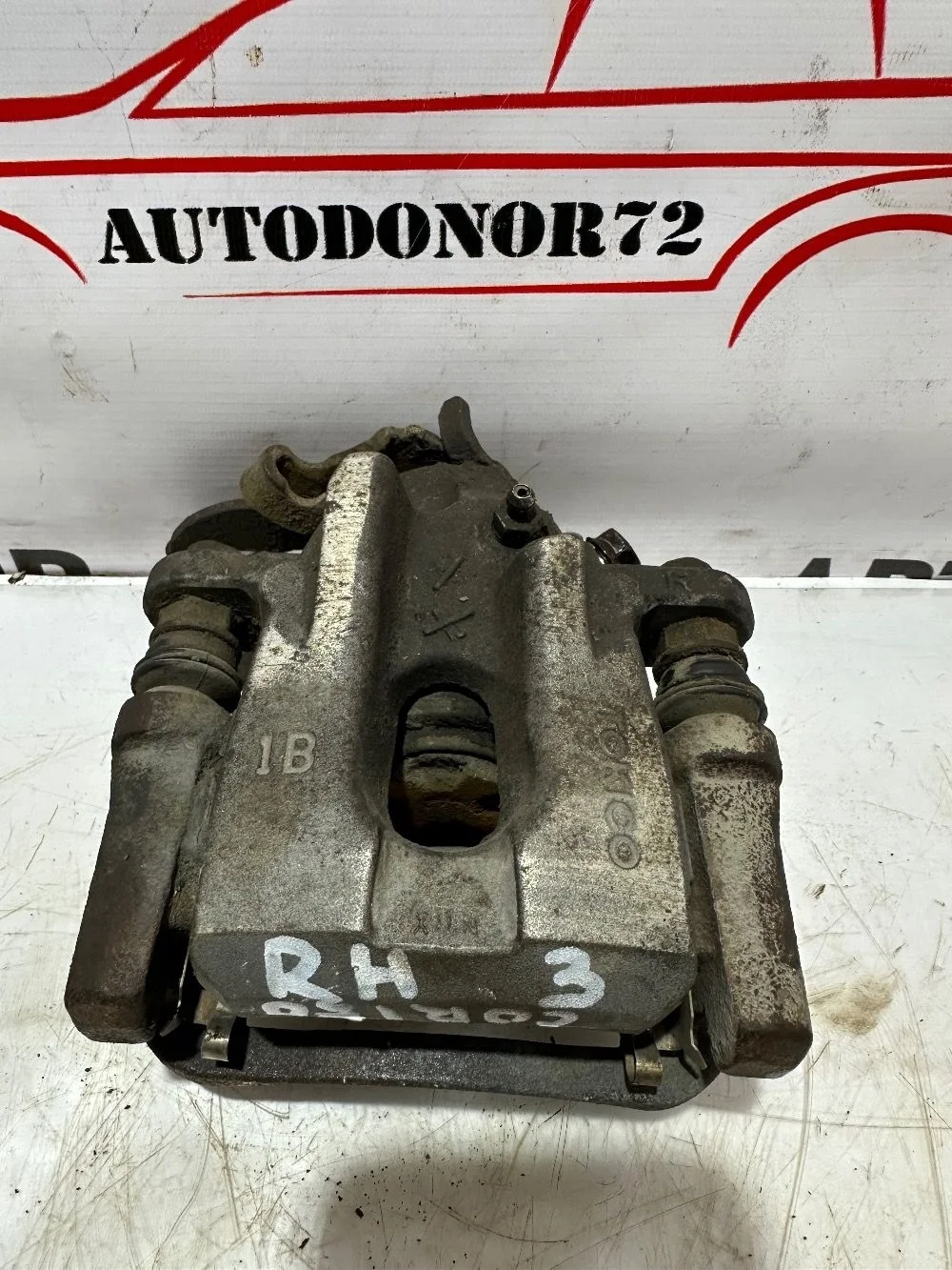 Суппорт задний правый Toyota Corolla X (2006—2010)