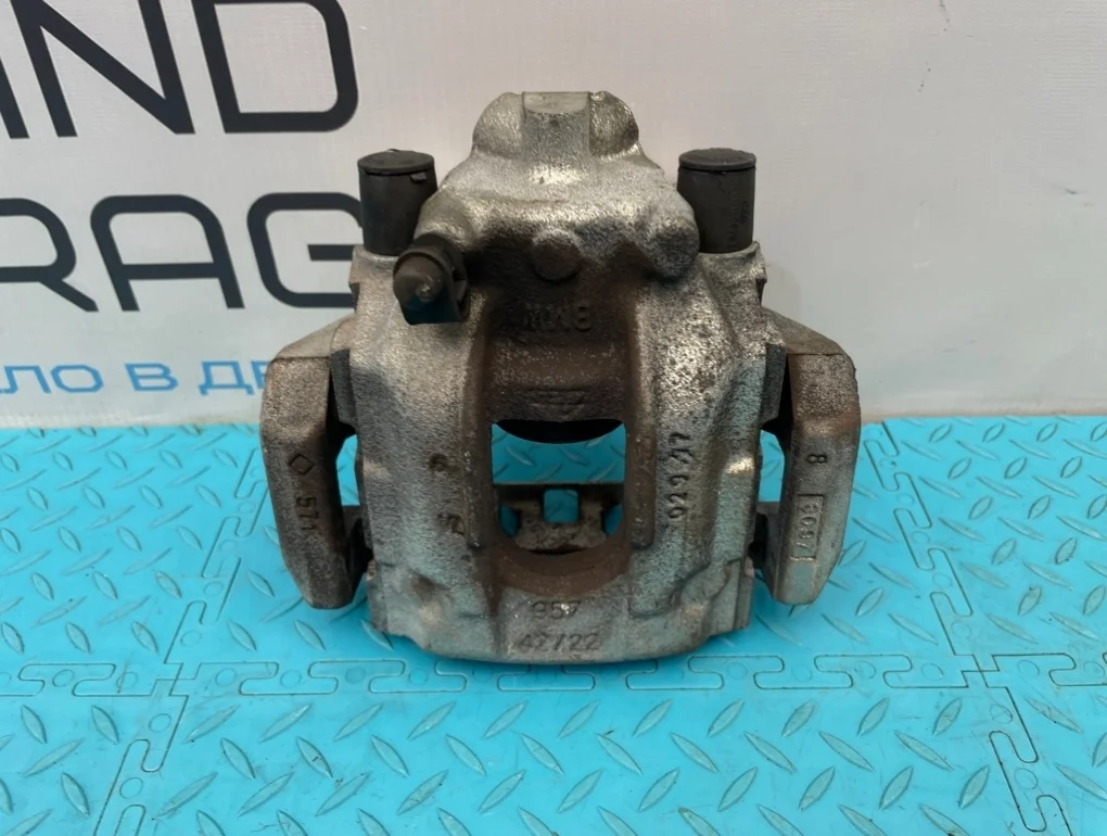 Суппорт Bmw X3 2007 34216765883 E83 N52B25A 2.5, задний левый