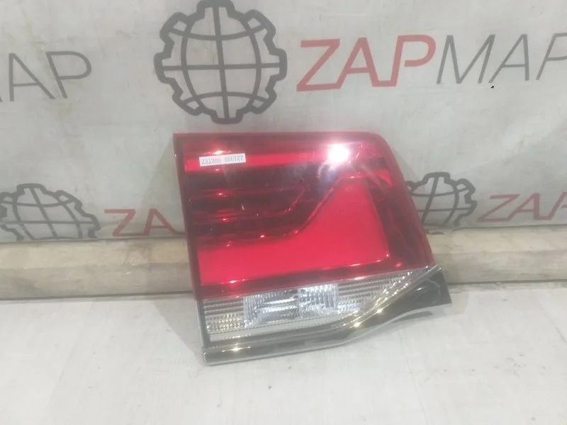 Фонарь бампера задний левый Toyota Land Cruiser