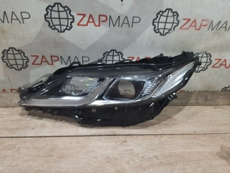 Стекло фары переднее левое Toyota Camry V70