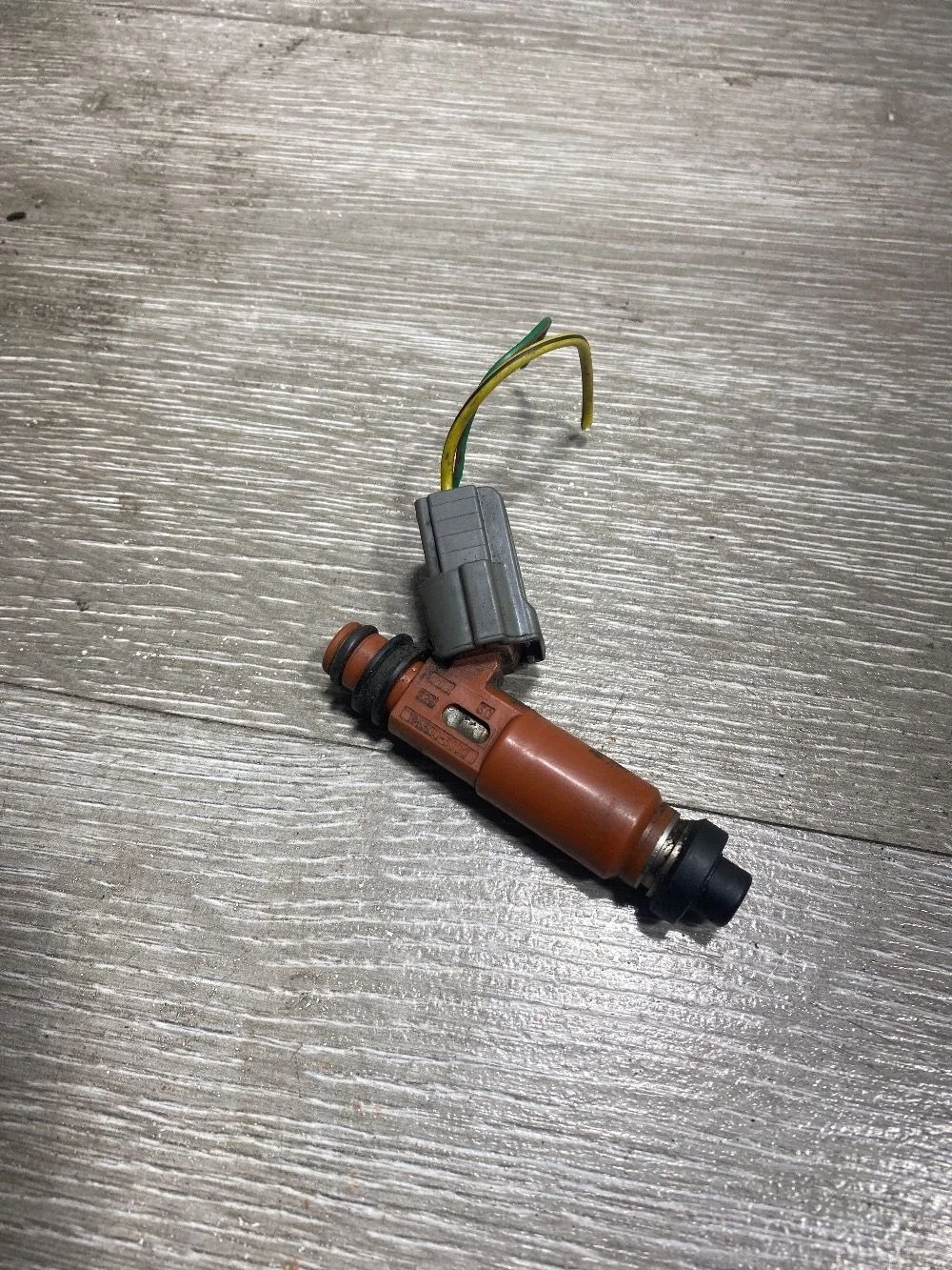 Форсунка топливная Mazda Demio DW (1996—2003)