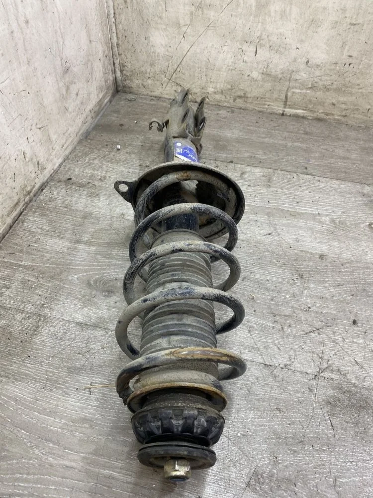 Амортизатор передний левый Volkswagen Lupo I (1998—2005)