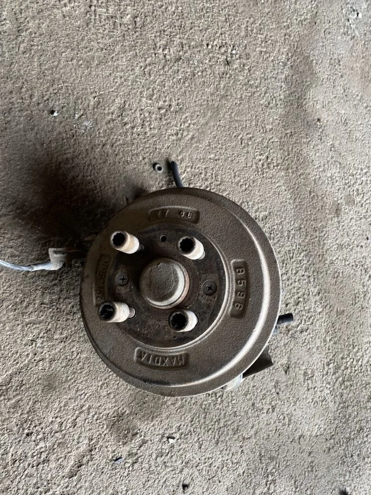 Кулак поворотный задний Mazda Familia BH (1994—1999)