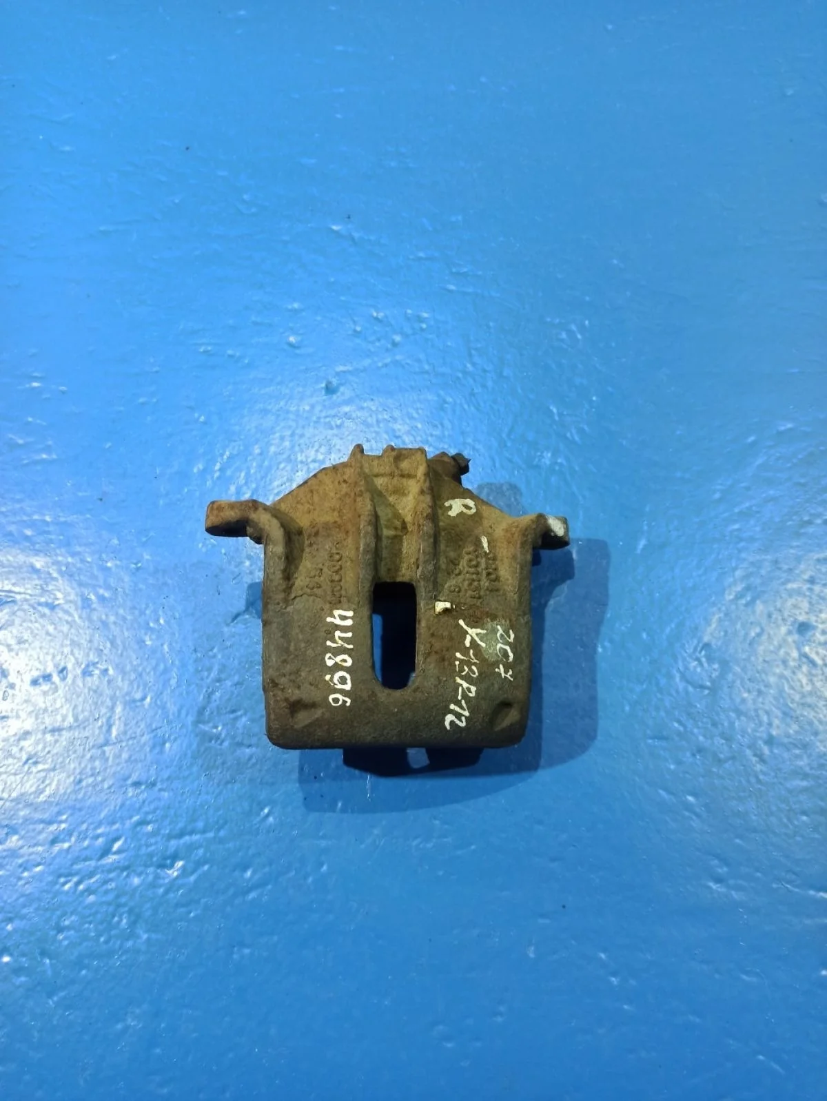 Суппорт тормозной передний правый Peugeot 207 I (2006—2009)