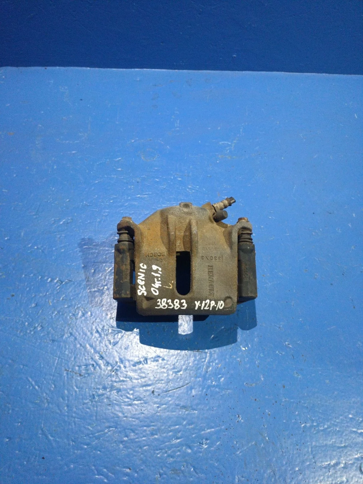 Суппорт тормозной передний левый Renault Scenic II (2003—2006)