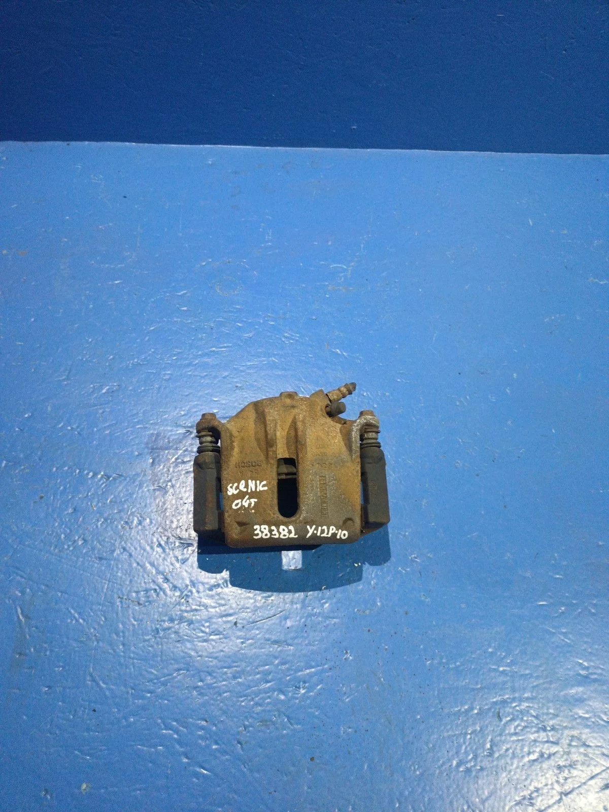 Суппорт тормозной передний левый Renault Scenic II (2003—2006)