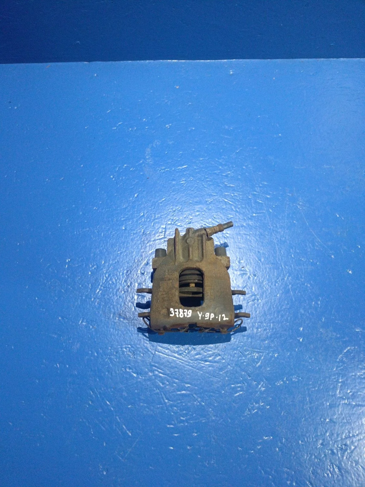 Суппорт тормозной передний левый Ford Focus I (1998—2004)