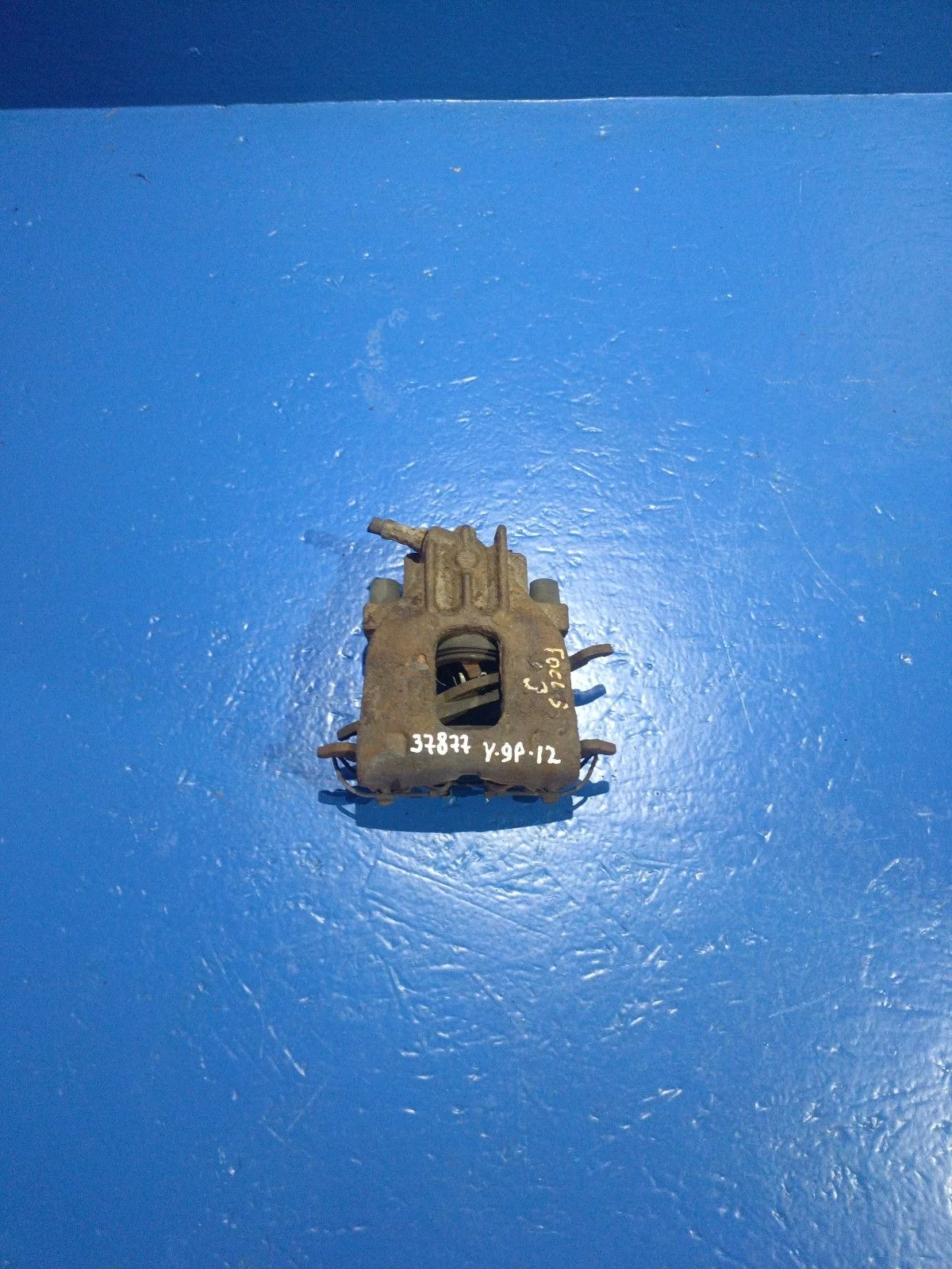 Суппорт тормозной передний правый Ford Focus I (1998—2004)