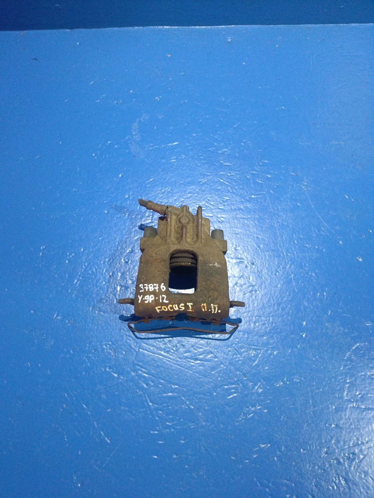 Суппорт тормозной передний правый Ford Focus I (1998—2004)