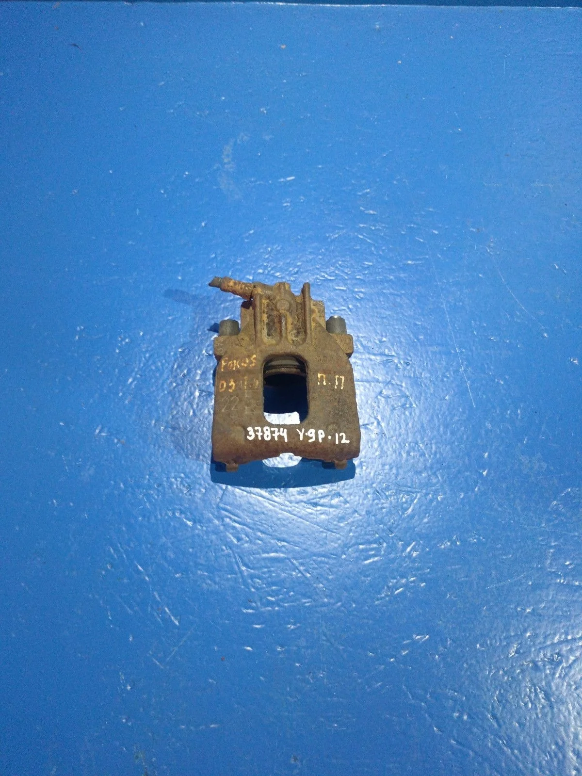 Суппорт тормозной передний правый Ford Focus I (1998—2004)