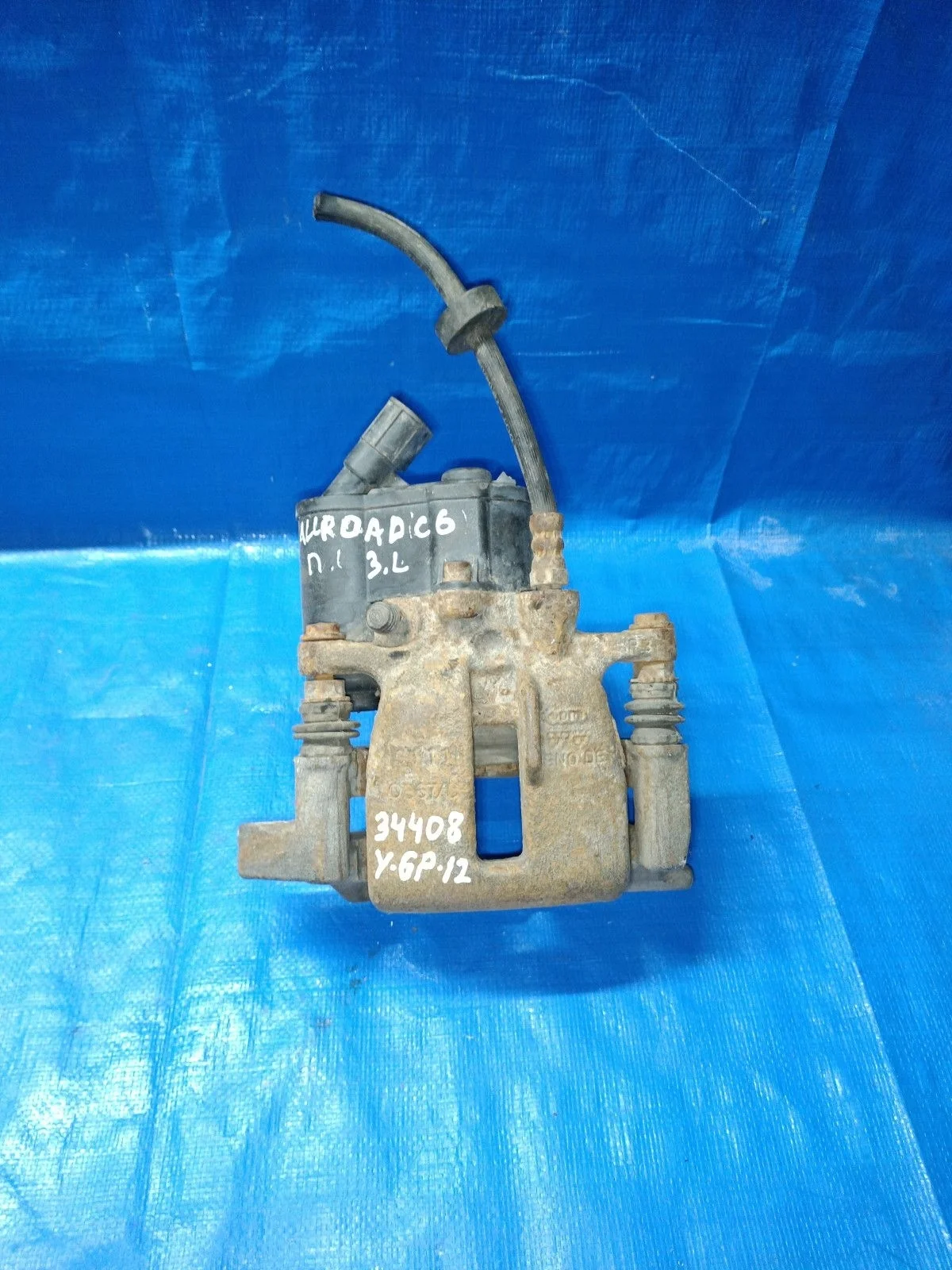 Суппорт тормозной задний левый Audi A6 Allroad Quattro C6 (2006—2008)