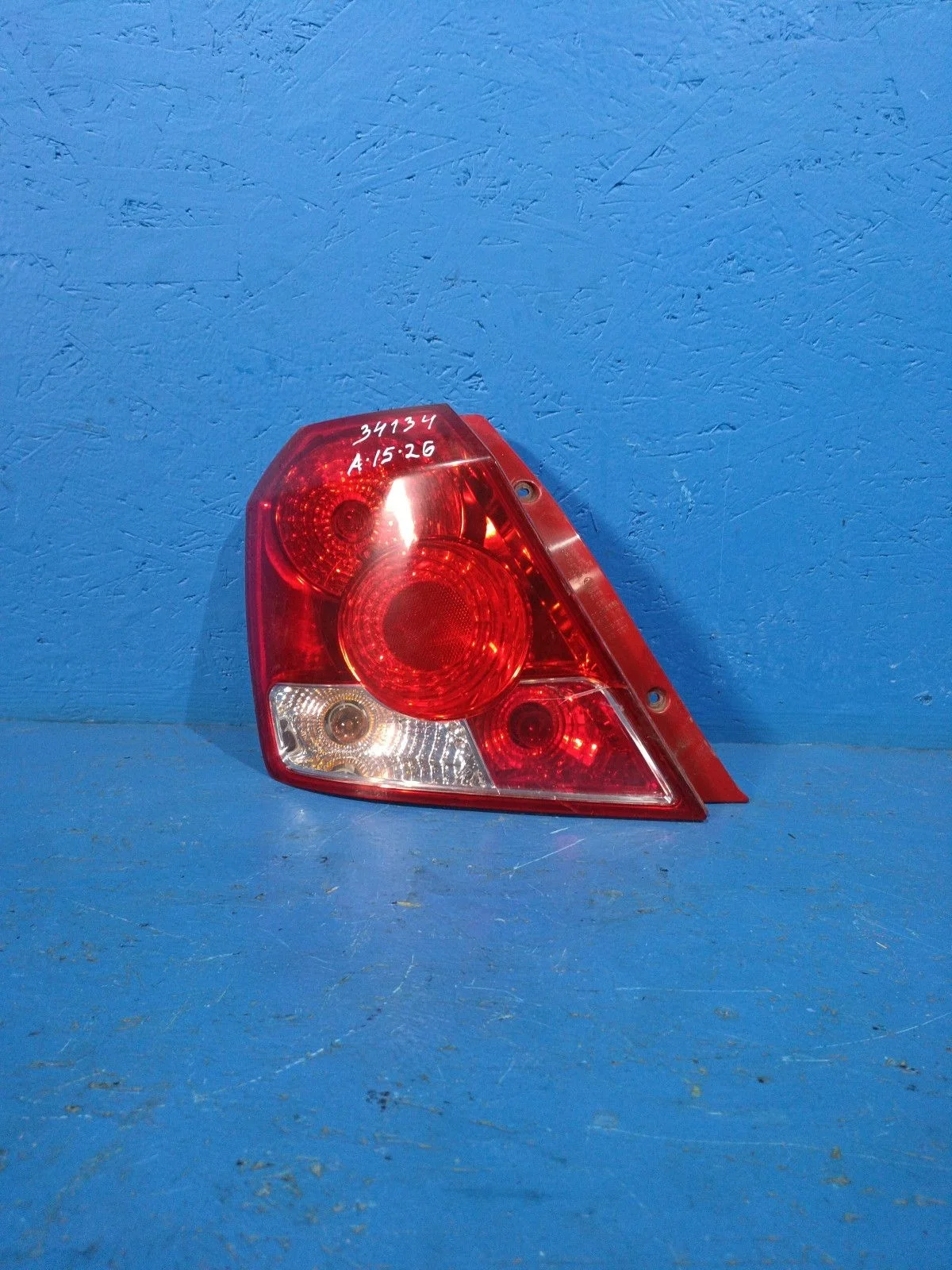 Фонарь задний левый Chevrolet Aveo I (2003—2008)