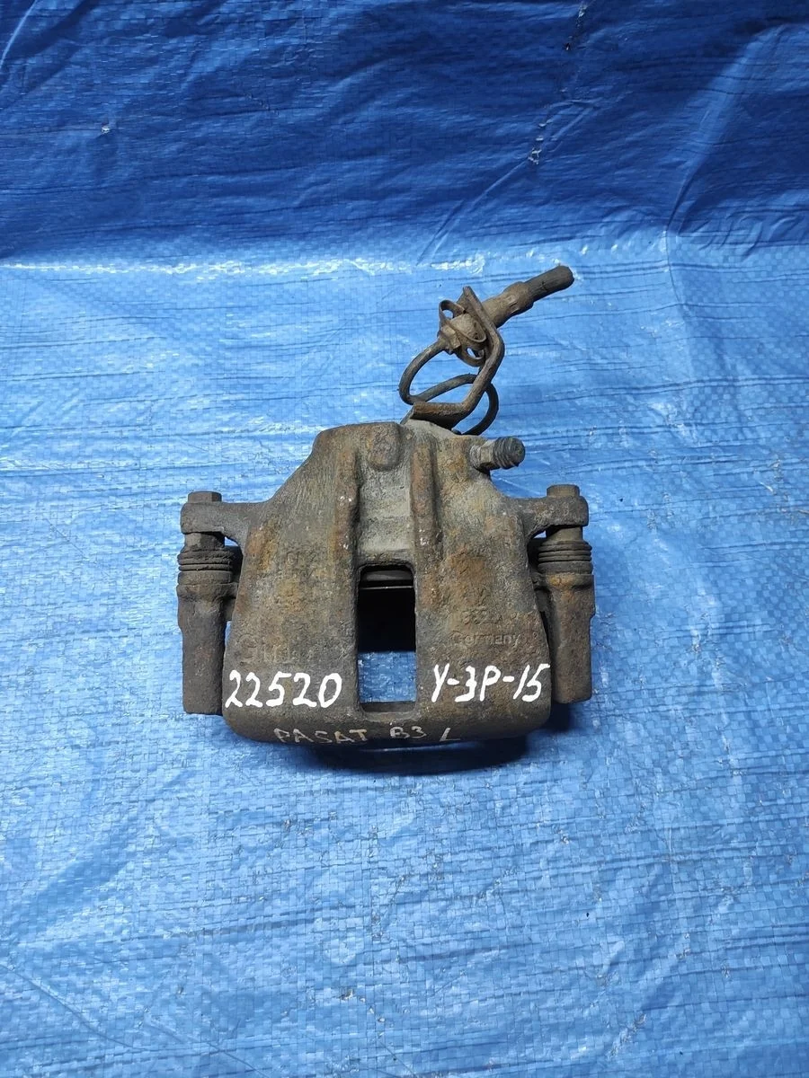 Суппорт тормозной передний левый Volkswagen Passat B3 (1988—1993)