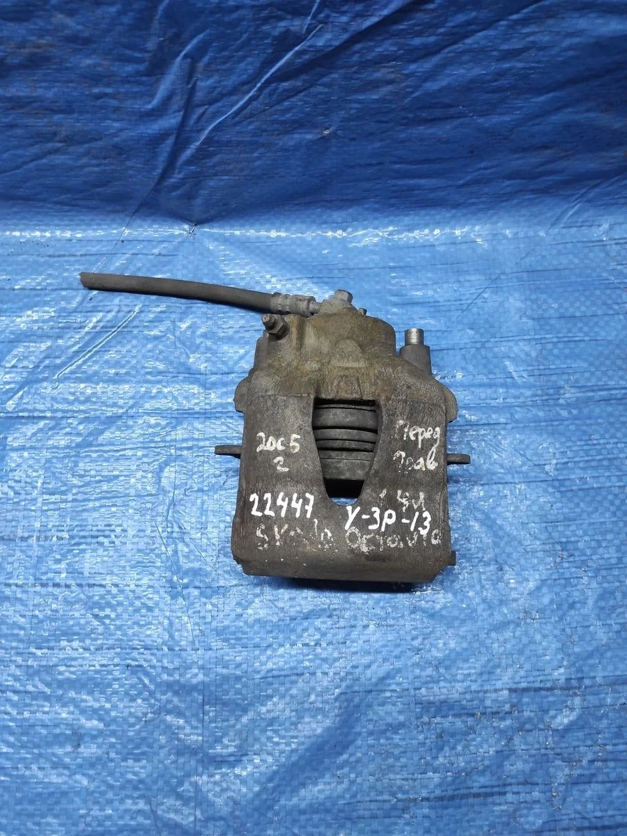 Суппорт тормозной передний правый Volkswagen Golf Mk5 (2003—2009)